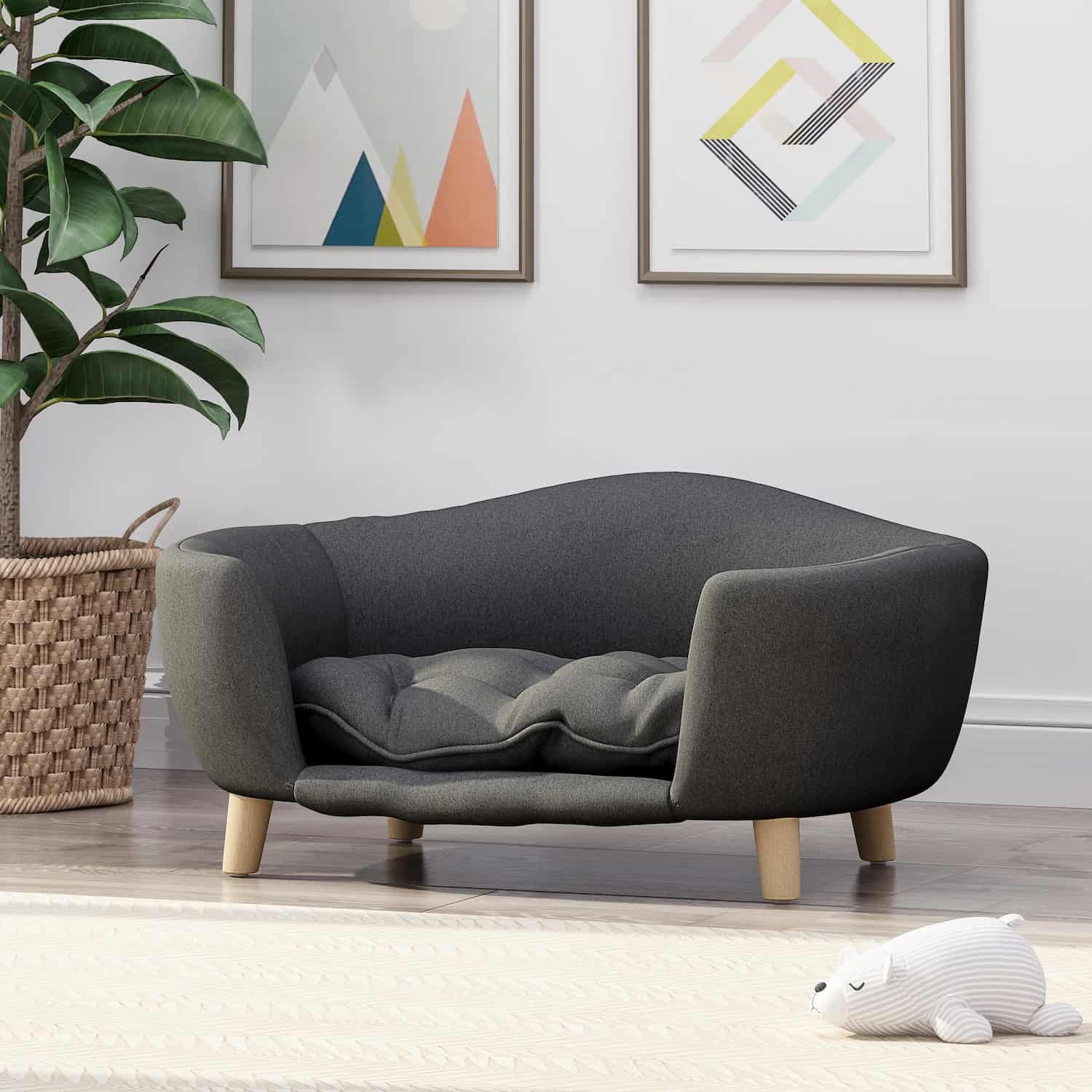 Dark gray tufted dog sofa with birch legs