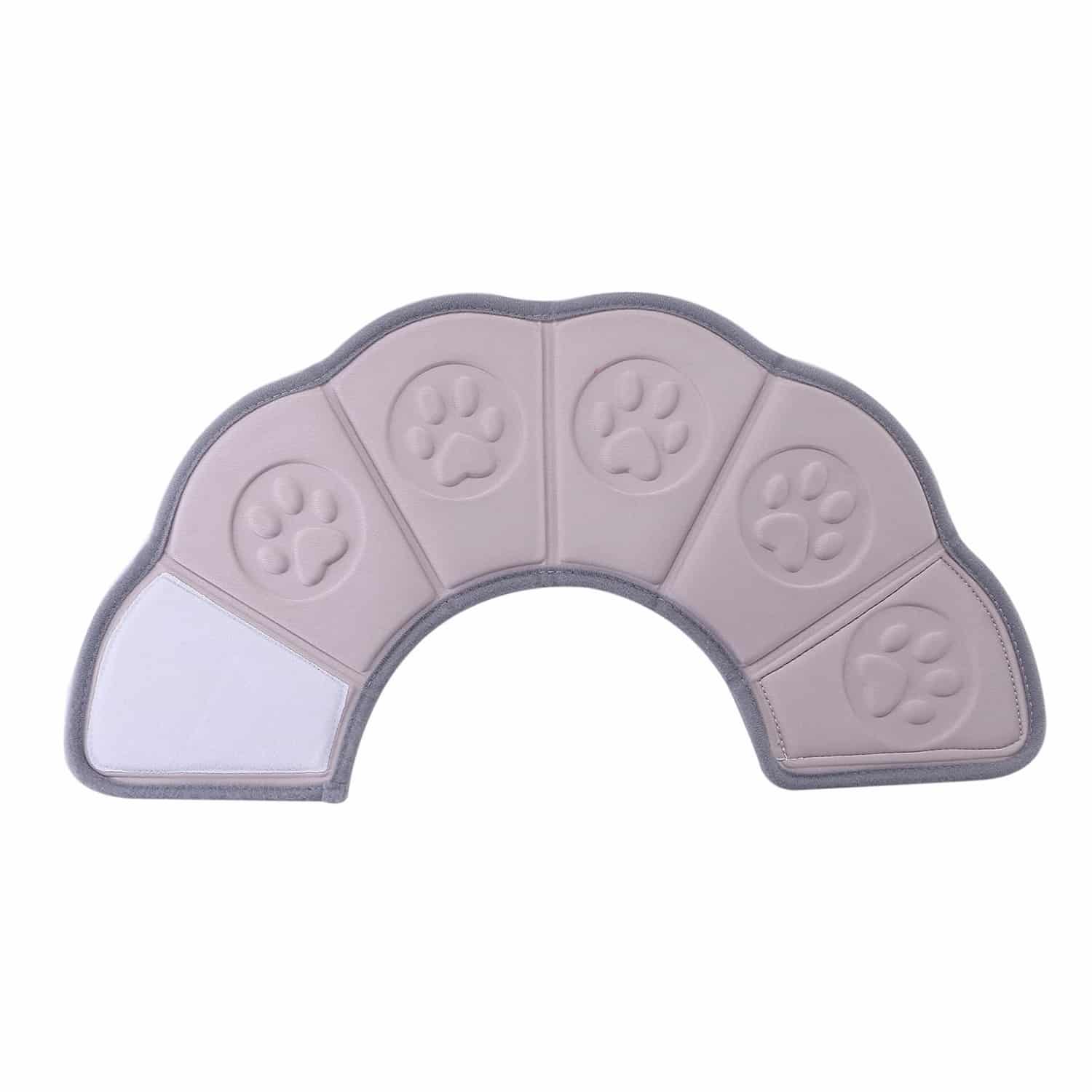 Soft EVA dog recovery cone with segmented structure and built-in massage dots, worn by Labrador lying down