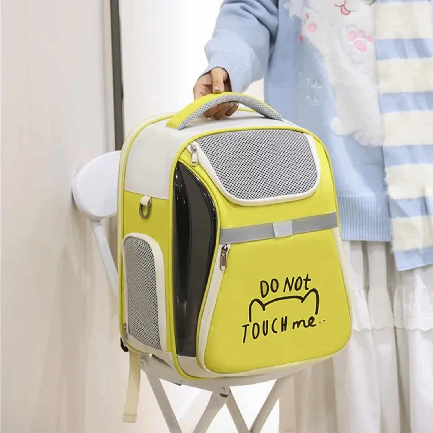 Open top mesh pet carrier backpack with head out opening and internal leash clip for cats and dogs