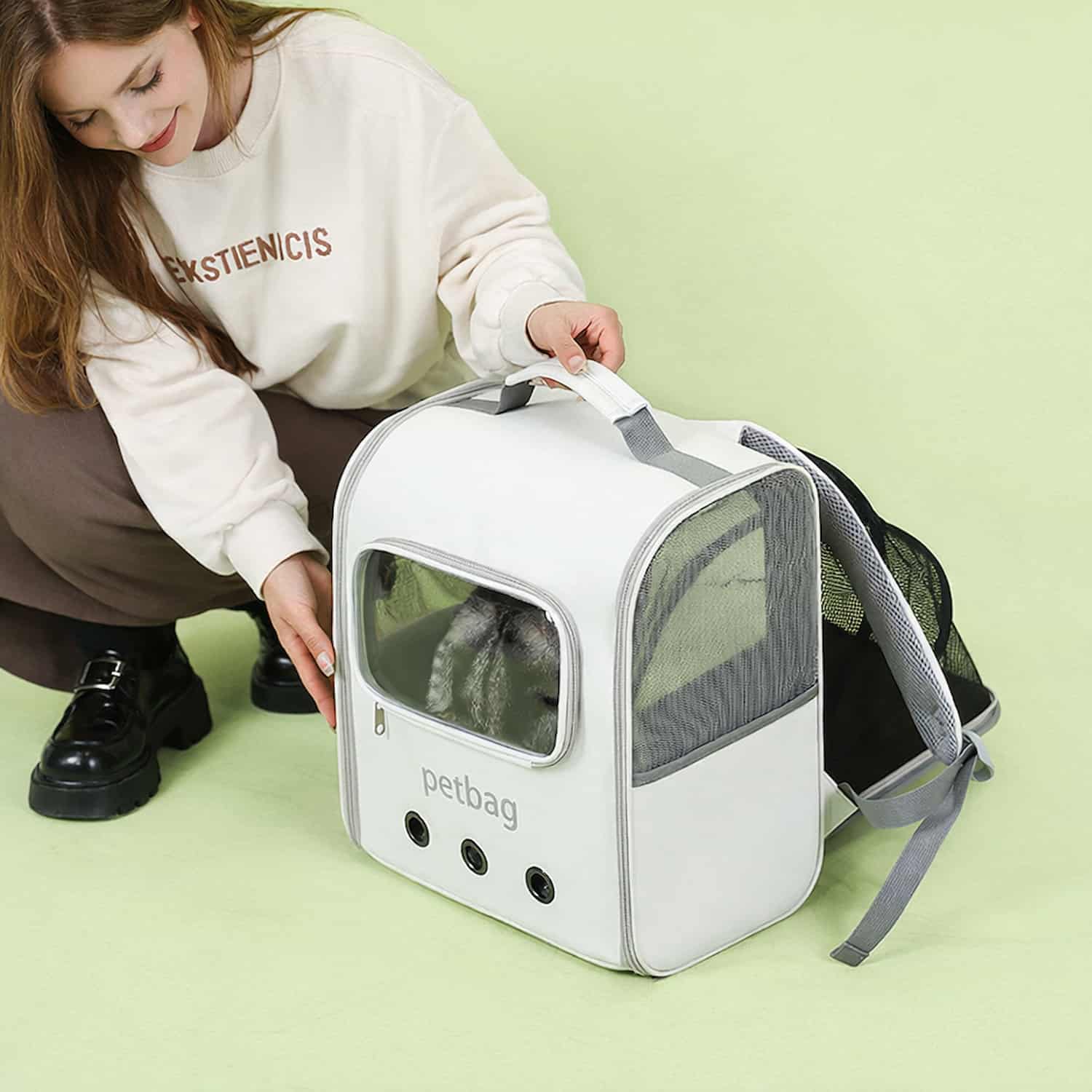 Expandable cat backpack with clear window and side expansion panels
