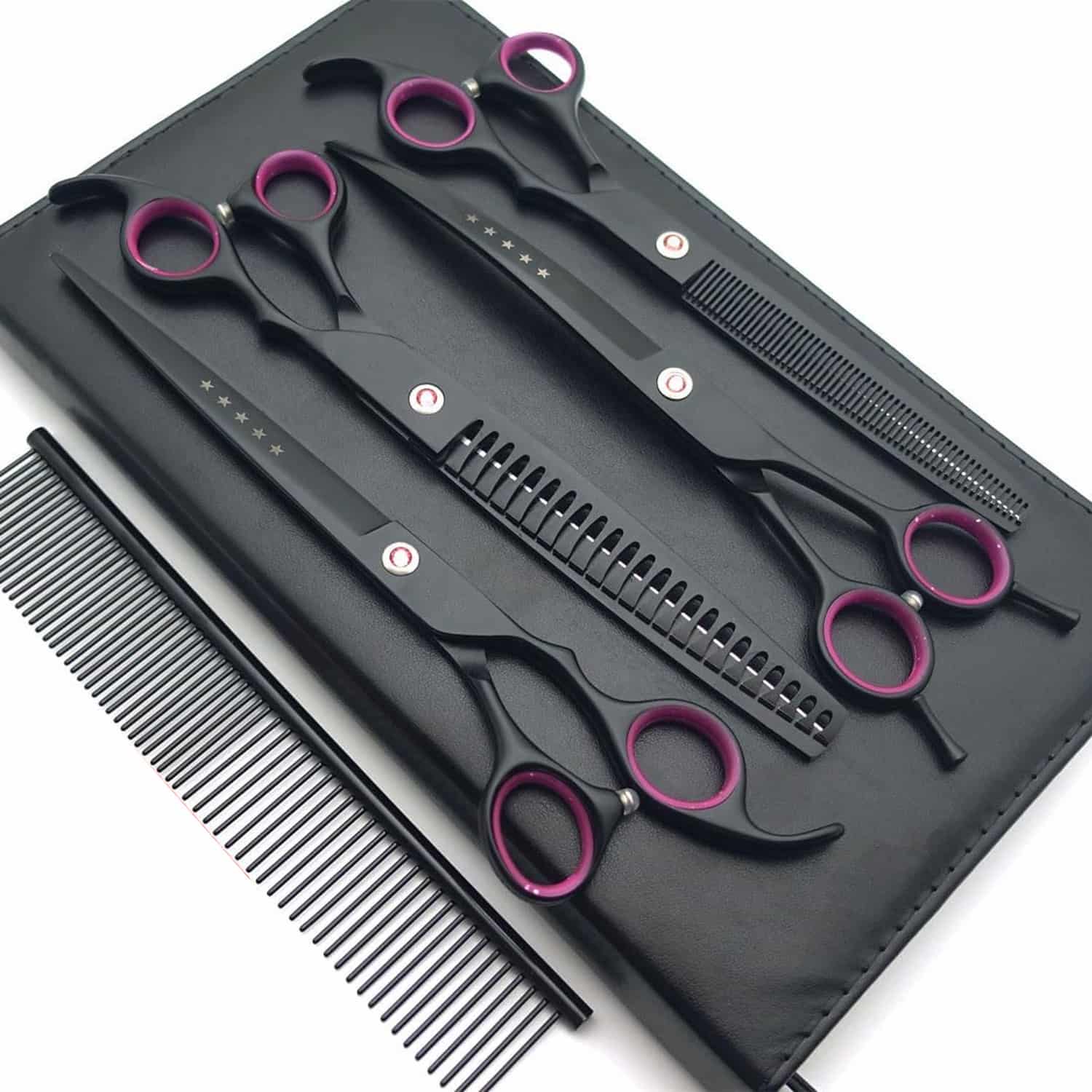 4-piece dog grooming scissors set with straight, thinning, curved, and chunker scissors, steel comb, cleaning cloth, and leather case