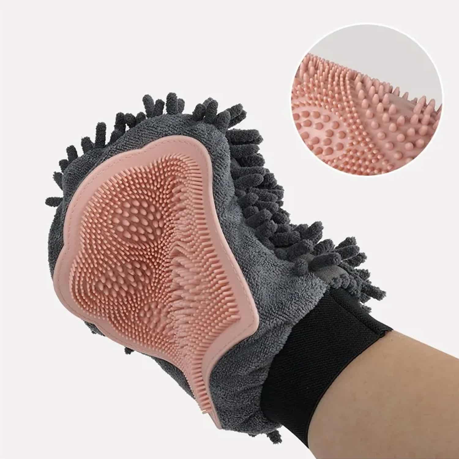 2-in-1 pet grooming glove showing microfiber side on knuckles and silicone bristle side on palm, being used on border collie puppy
