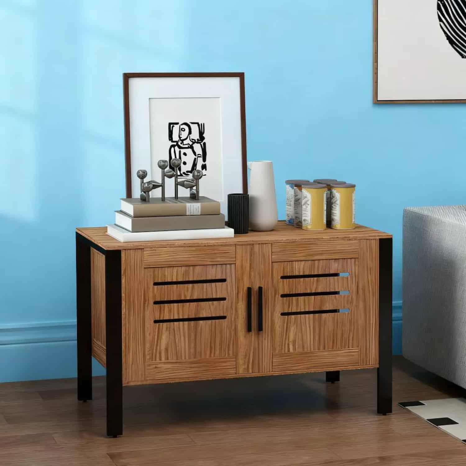 Brown wood litter box cabinet with tall legs and ventilation vents