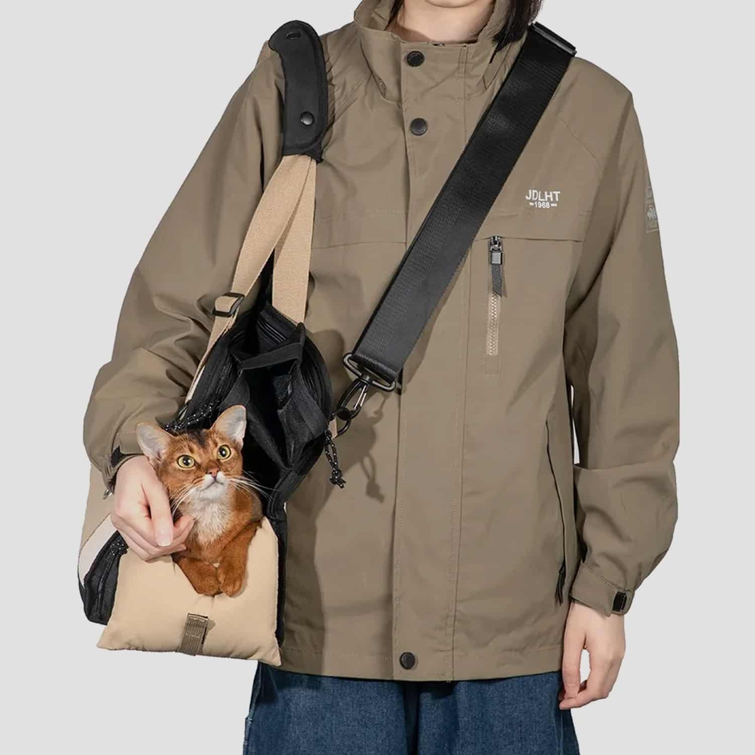 Soft nylon pet carrier travel bag with anti-escape buckle, side mesh panel, shoulder strap, and sofa conversion mode for cats and dogs up to 20 lbs