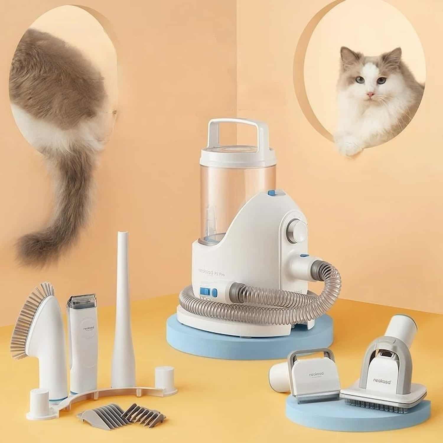 5-in-1 pet grooming vacuum system with electric clipper, grooming brush, deshedding tool, cleaning brush, and nozzle attachments, captures hair directly into vacuum canister during use